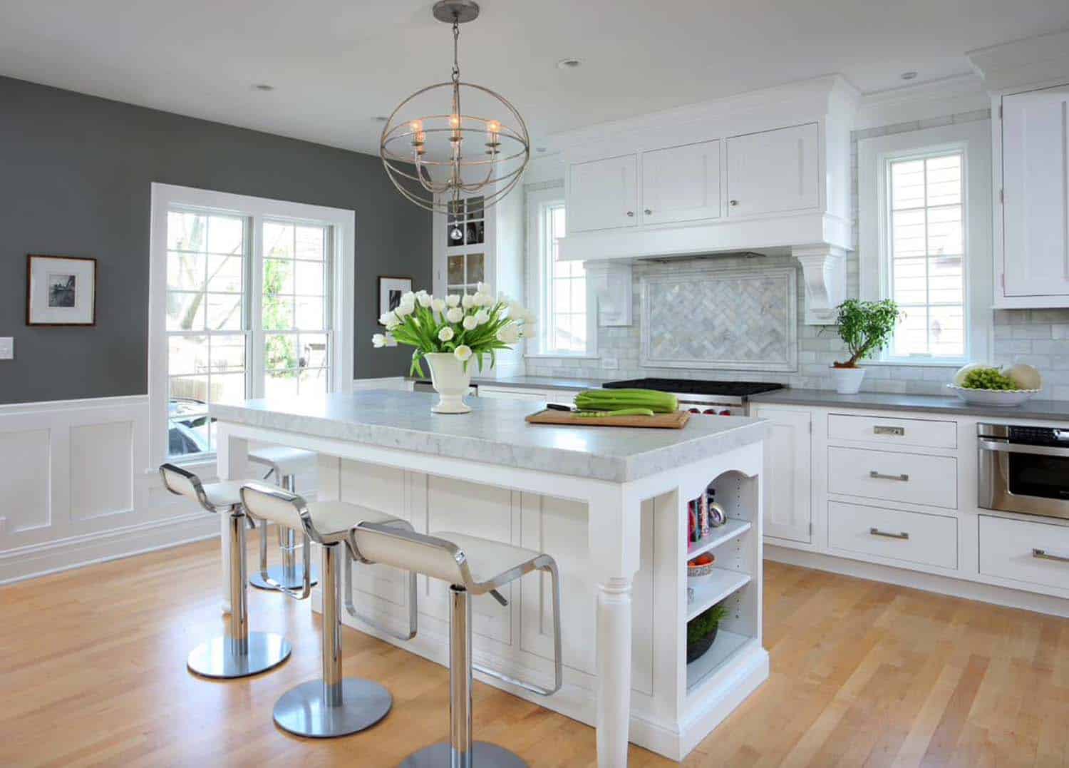 carrara marble kitchen with butcher block table