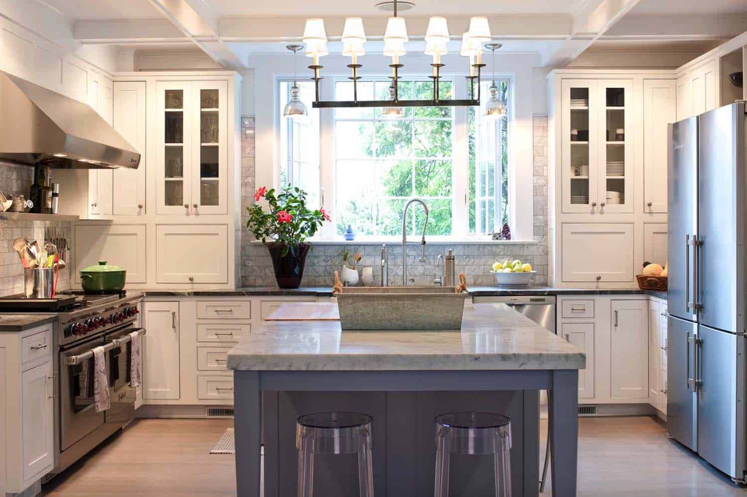 carrara marble kitchen with butcher block table
