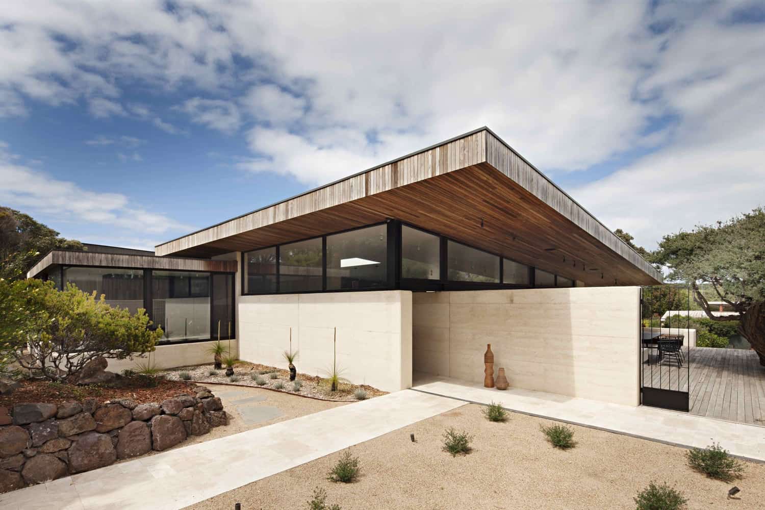 Coastal home in Australia showcases rammed earth and timber