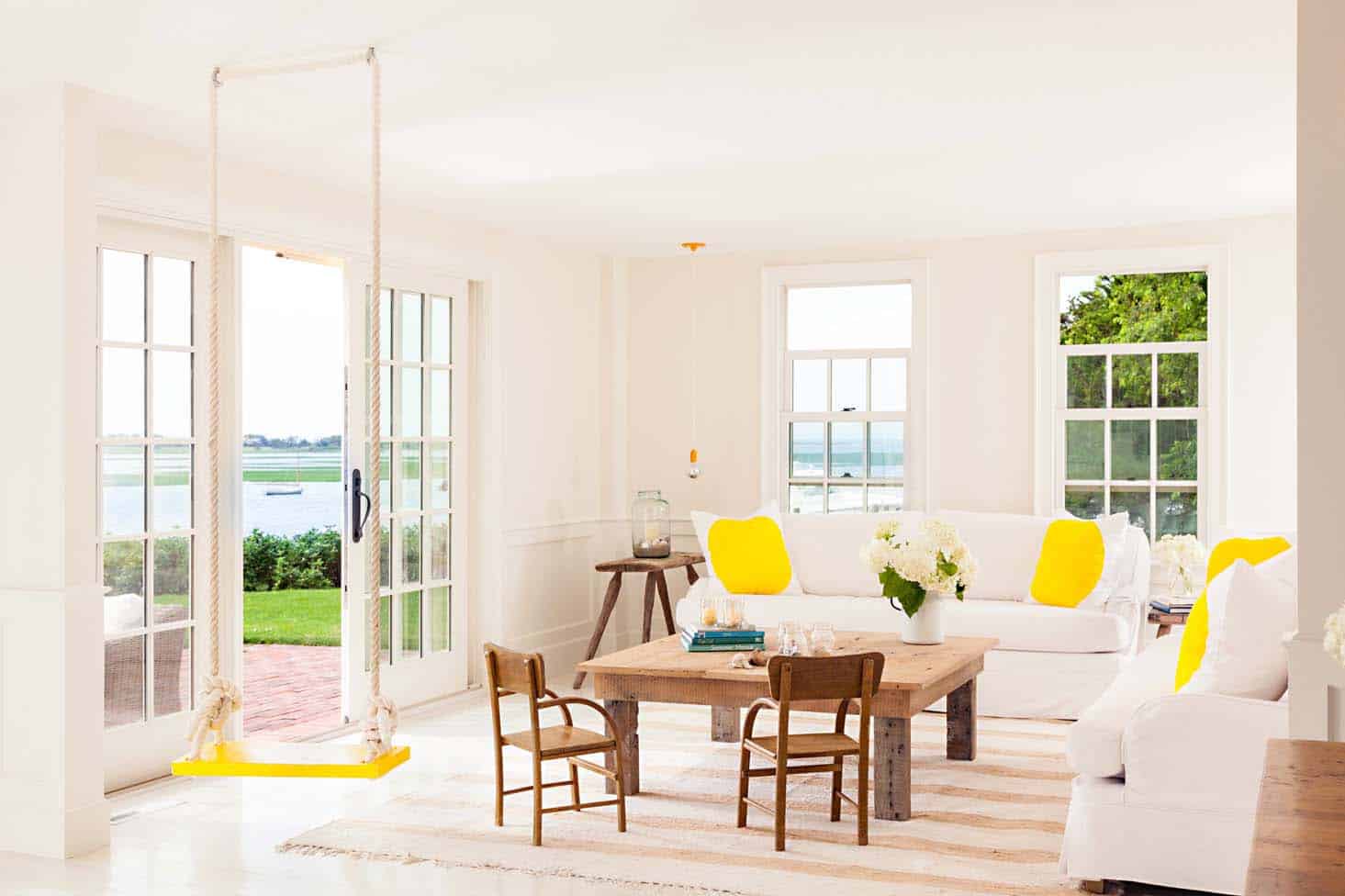 Cape Cod-style cottage radiates with pops of sunshine yellow