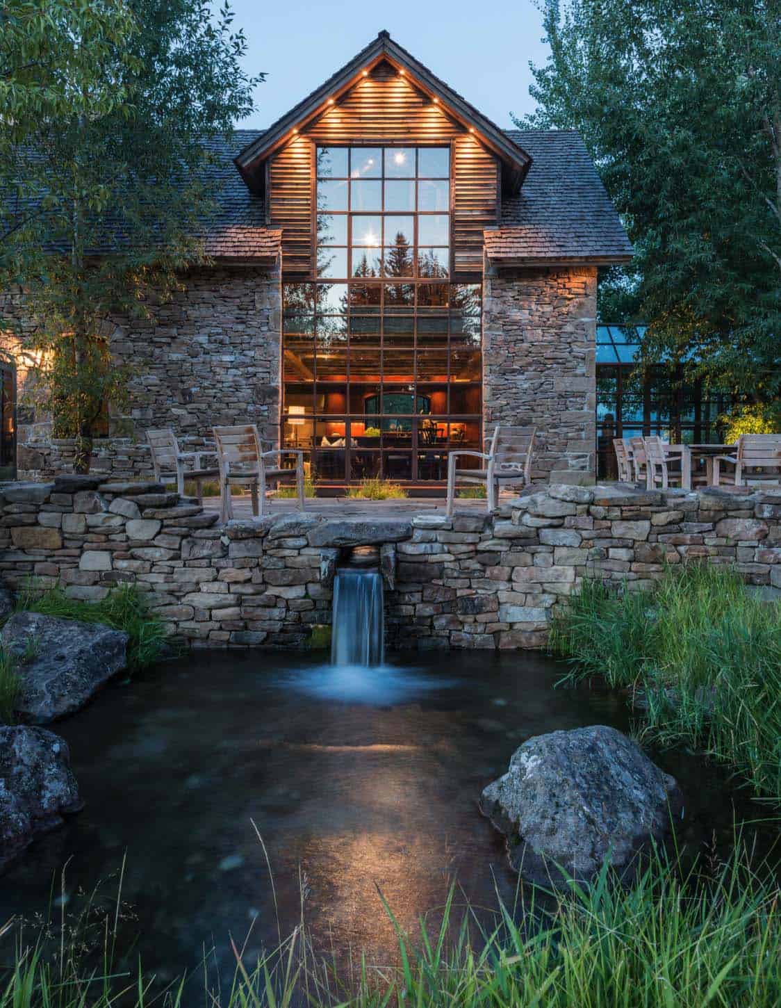 Rustic stone and timber dwelling overlooking the Grand Tetons