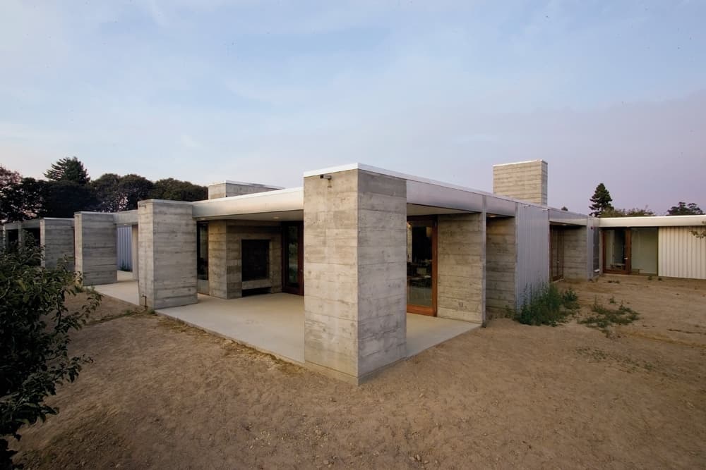 featured posts image for Concrete and glass farmhouse nestled in an orchard