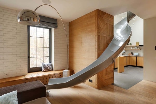 featured posts image for Cool slide adds playfulness to a two-story apartment in Kiev