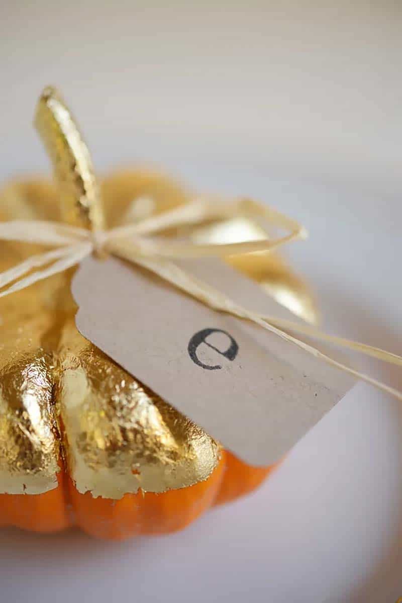 creative-thanksgiving-place-card-ideas-gold-painted-pumpkin