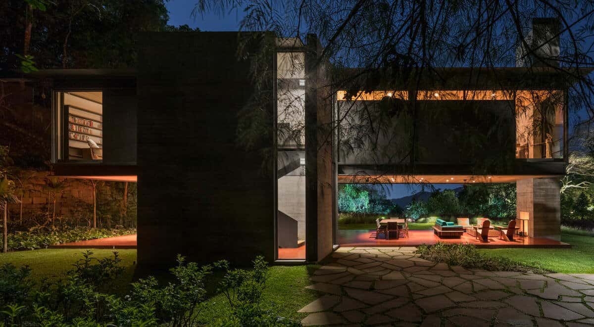 minimalist-steel-glass-box-shelter-exterior-night-view