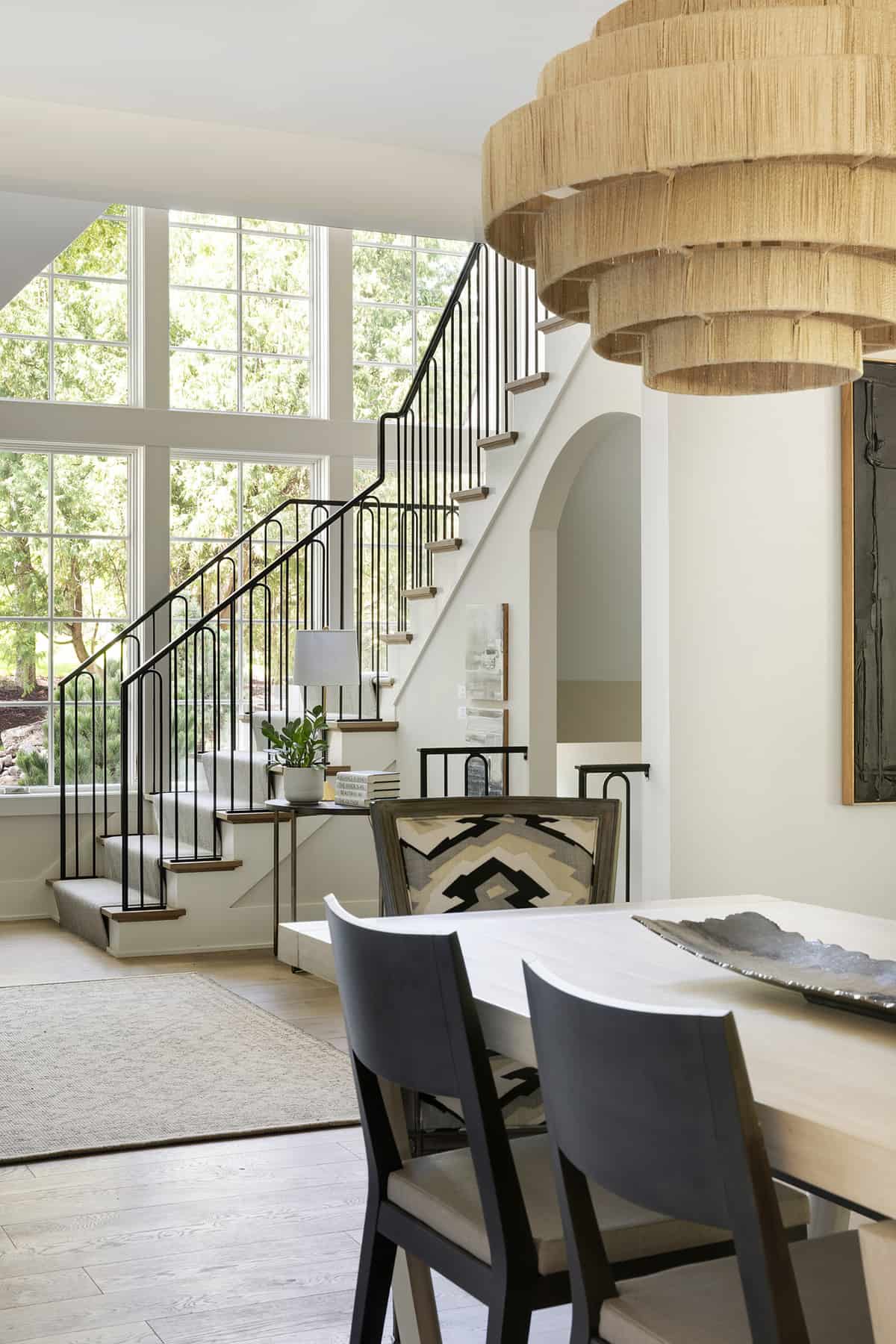transitional-staircase-with-dining-room