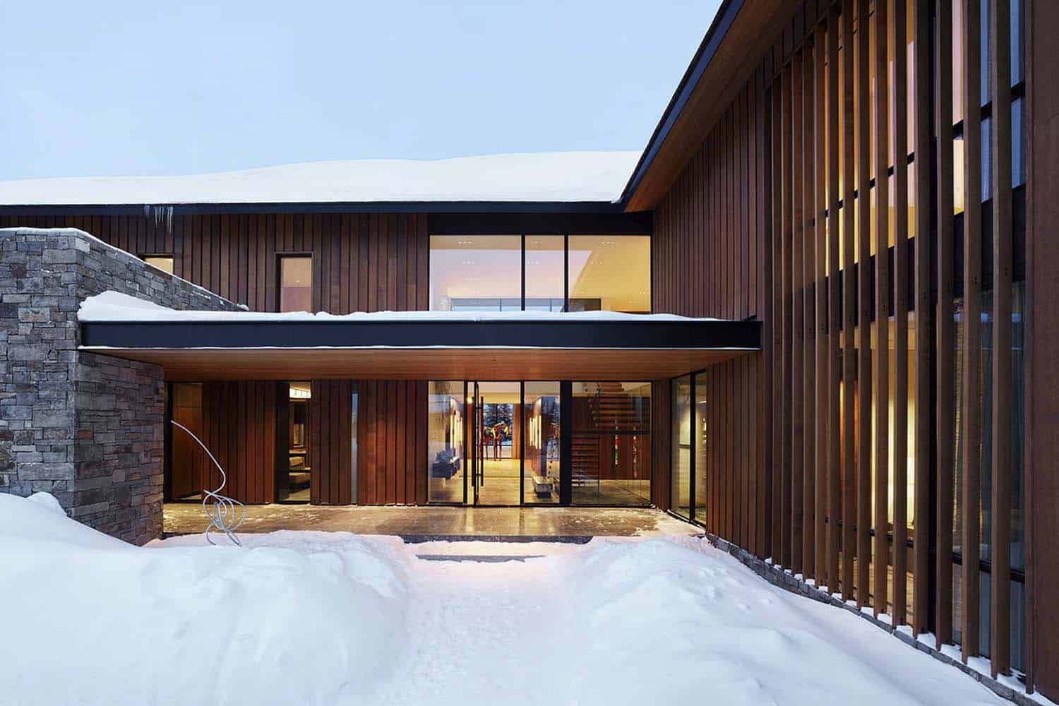 contemporary-wyoming-mountain-retreat-exterior-with-snow