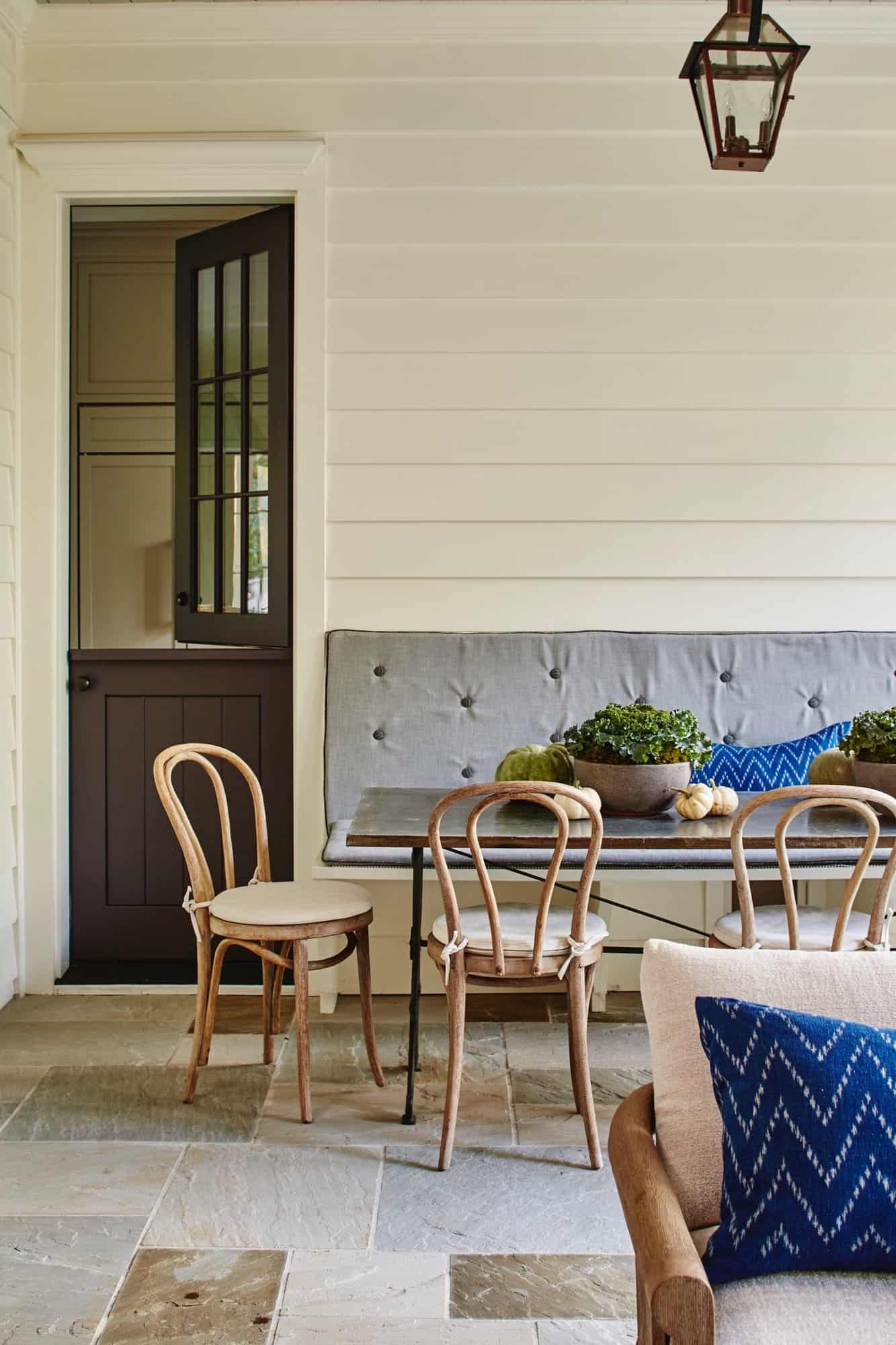 transitional-style-covered-porch-outdoor-dining