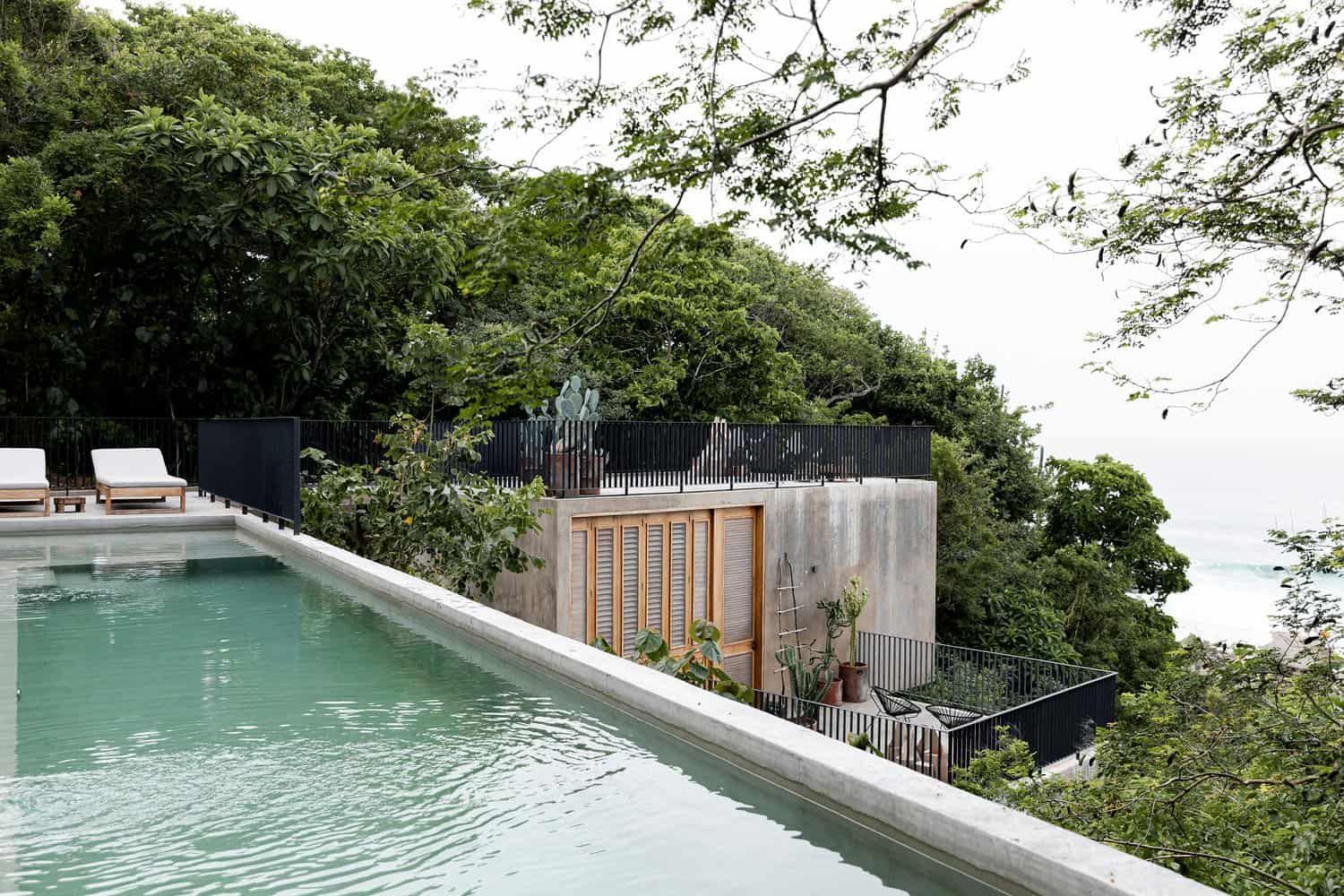 contemporary-hillside-home-pool