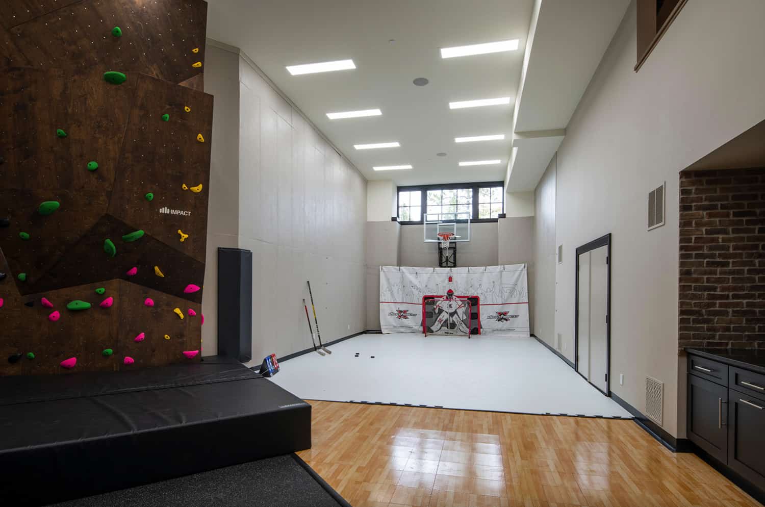 rustic-modern-sport-court-with-climbing-wall