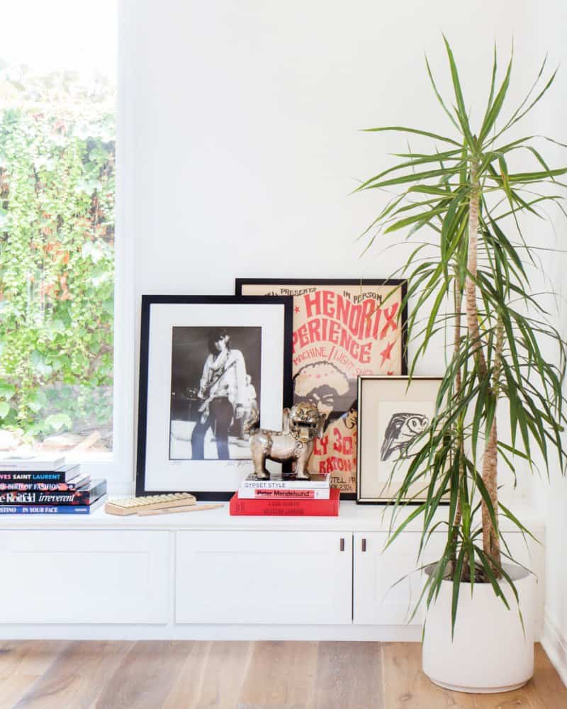 traditional-living-room-framed-artwork-on-a-console-table