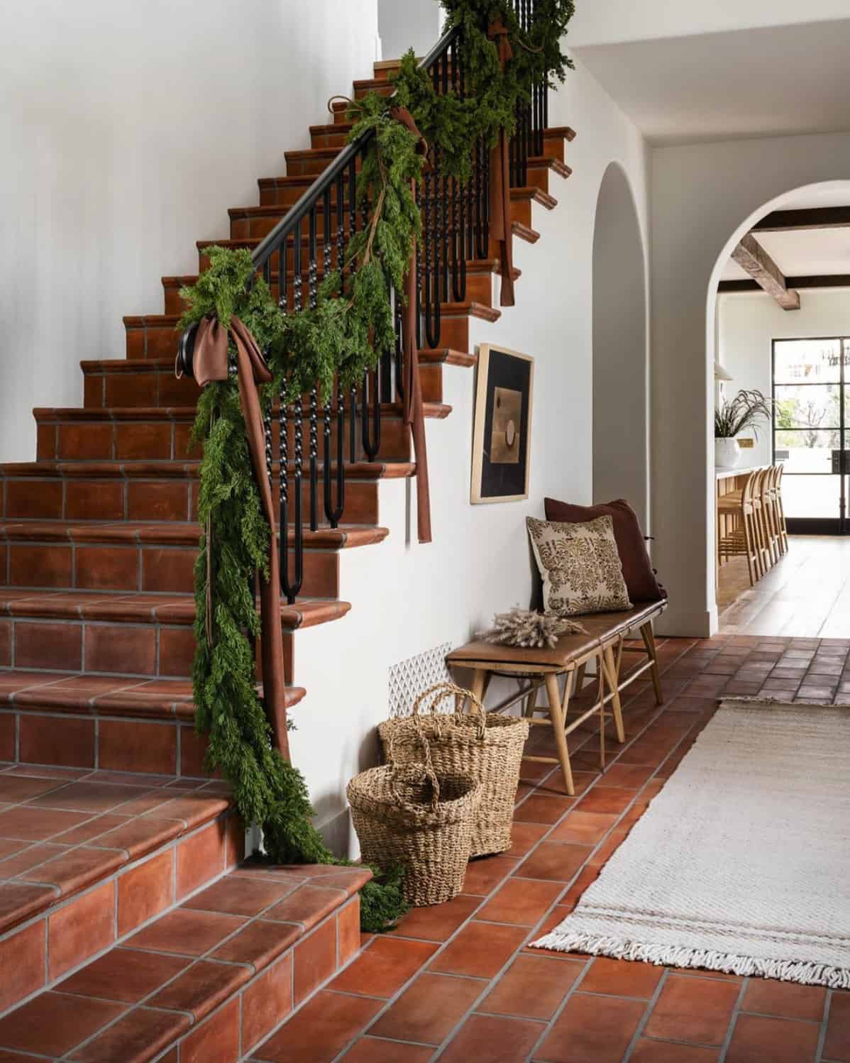 staircase-banister-draped-with-garland