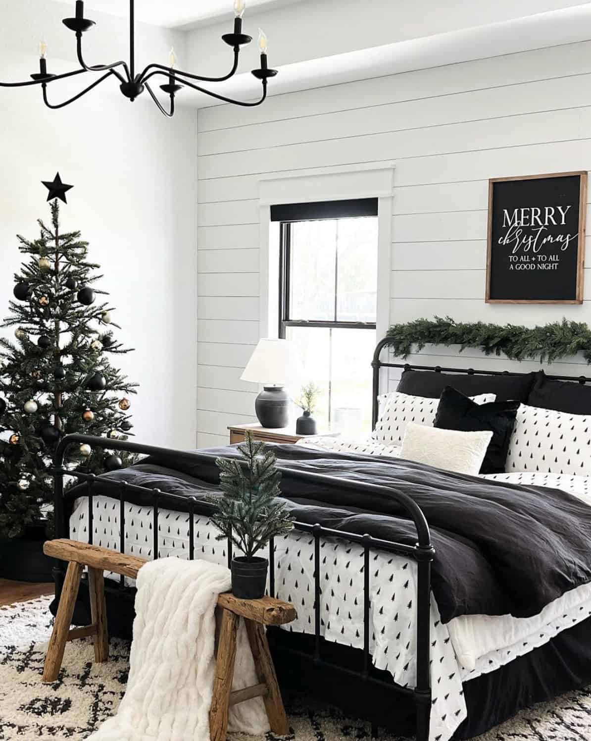 christmas-decorated-bedroom-with-a-tree-and-garland