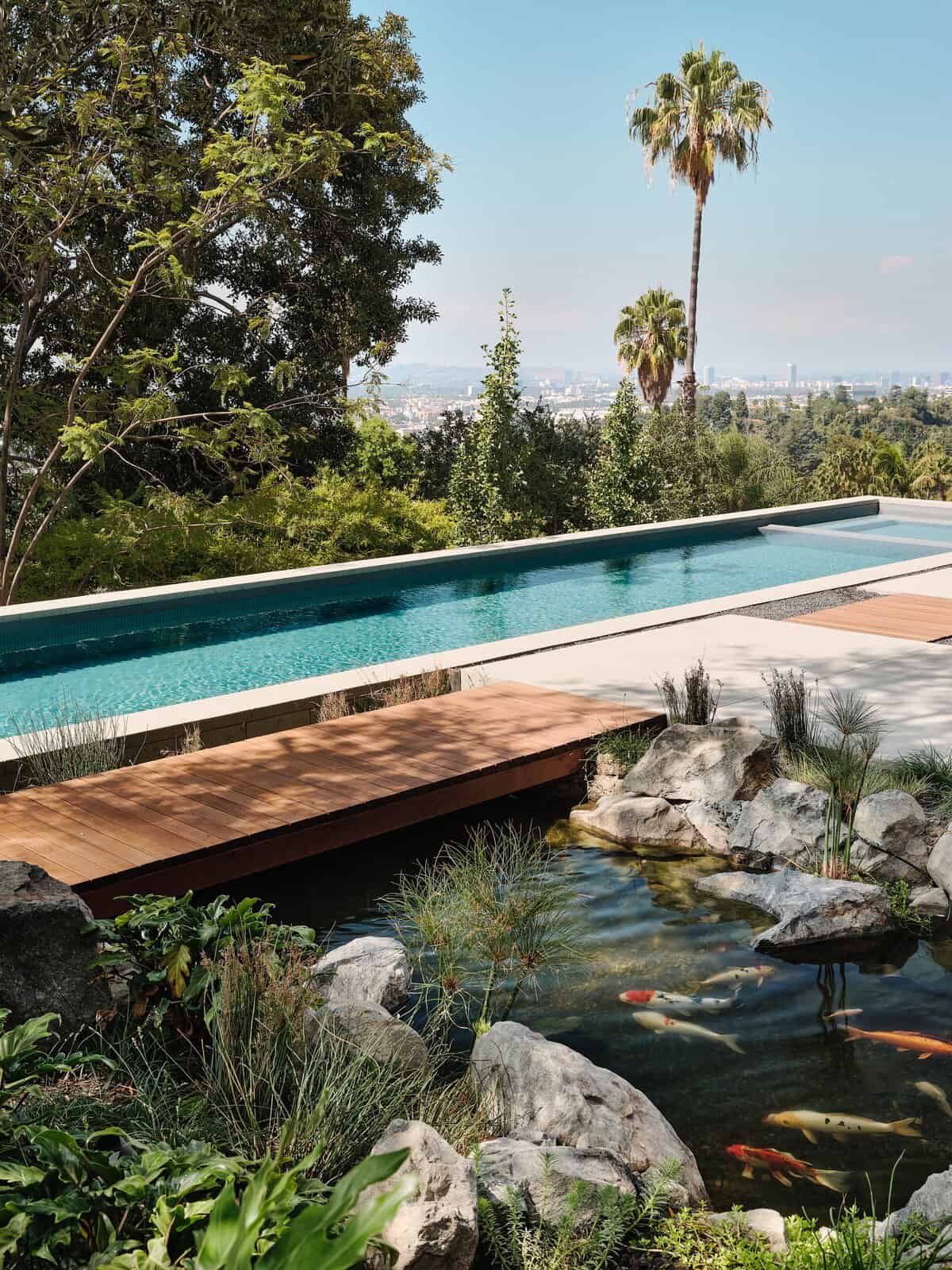 modernist-home-exterior-with-koi-pond-and-pool