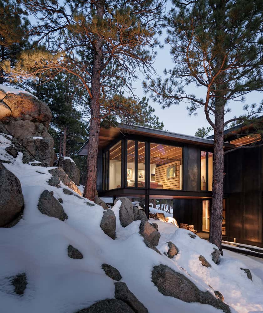 steel-clad-home-exterior-with-snow-dusk