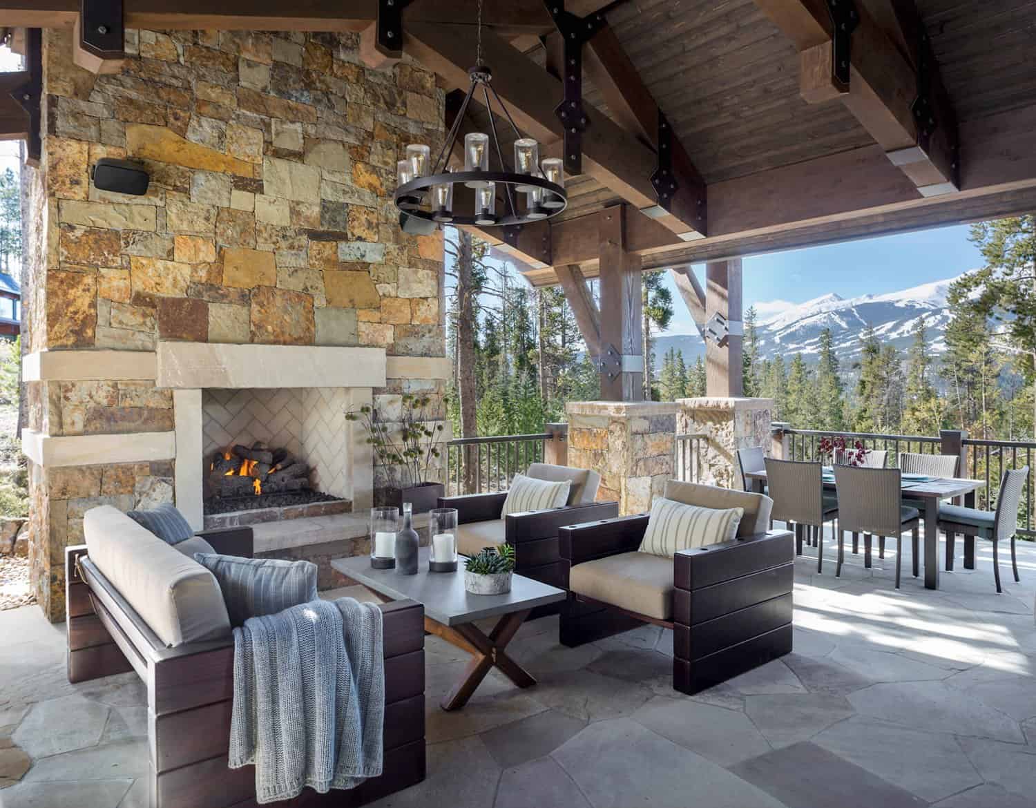 rustic-mountain-home-covered-patio-with-a-fireplace