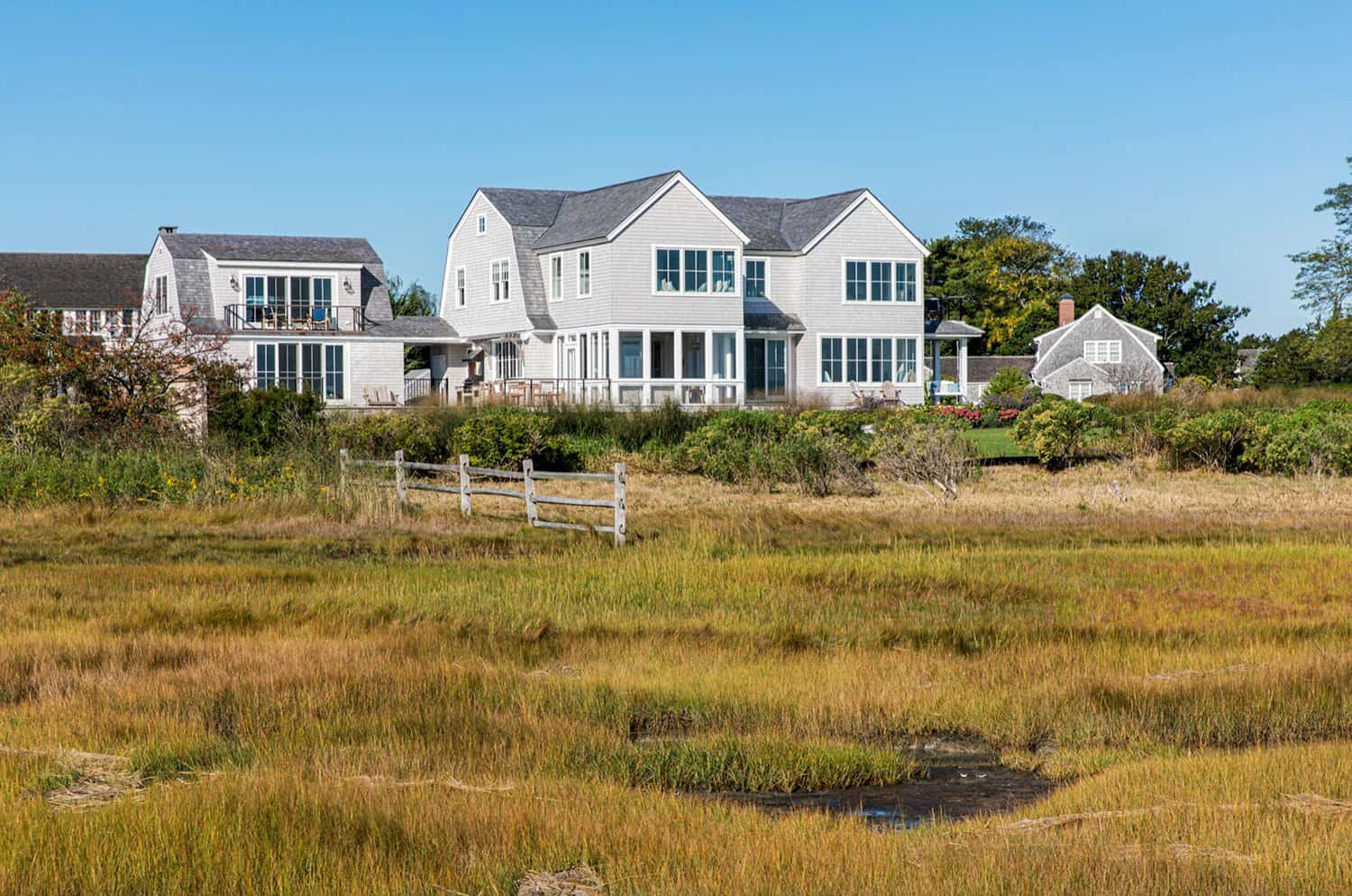 beach-style-house-exterior-with-a-view-of-the-marsh