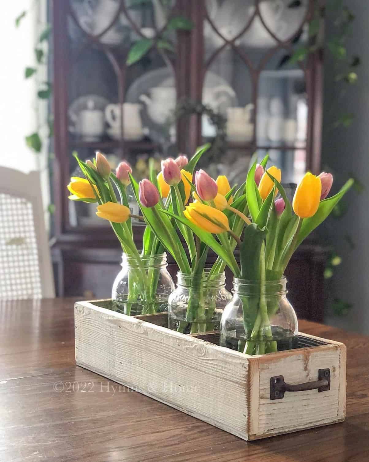 divided-wood-drawer-with-fresh-tulips