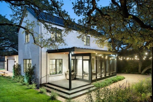 featured posts image for A beautiful white brick Texas home seamlessly merges into its landscape