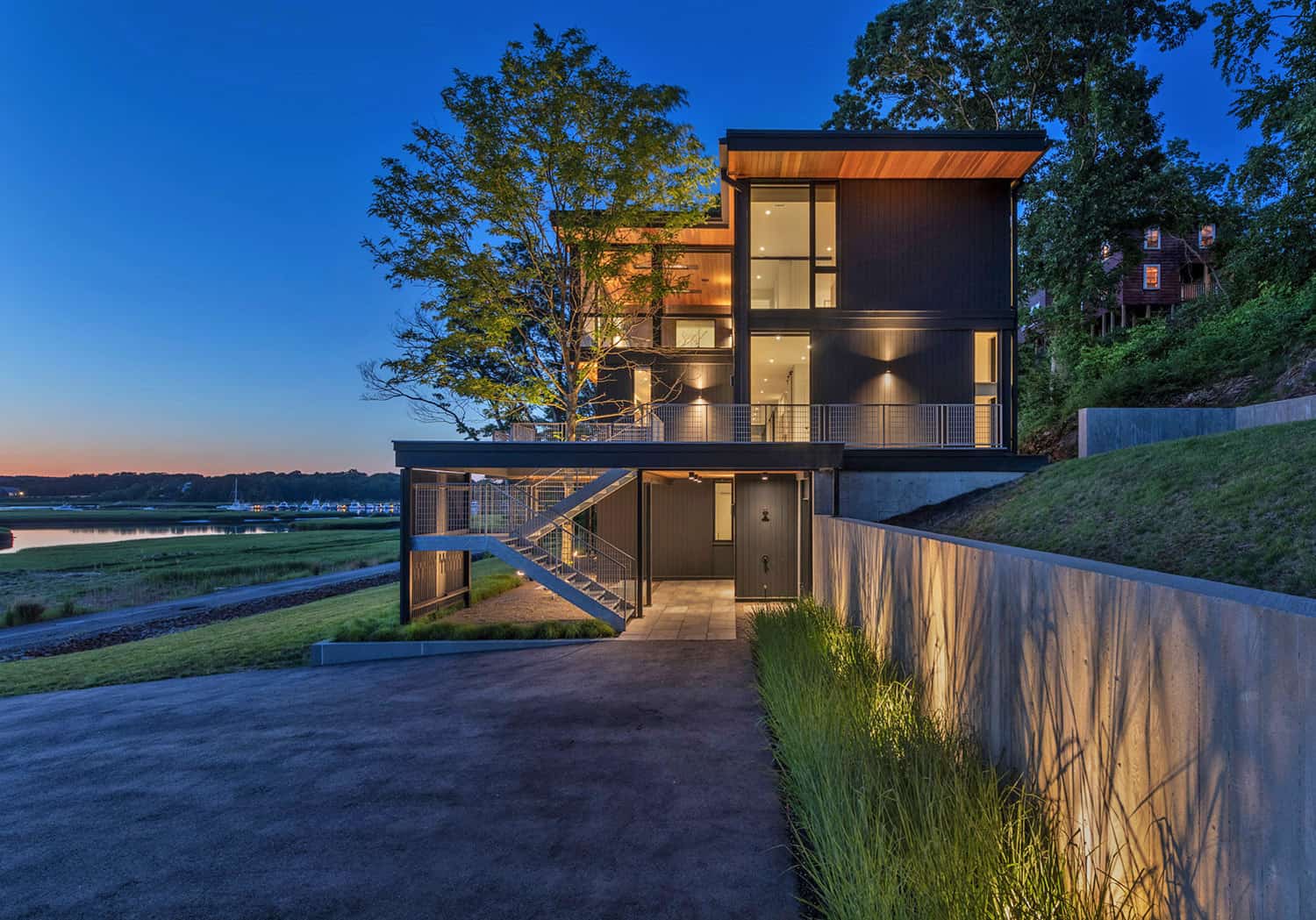This modern hillside house has amazing views over the Annisquam River