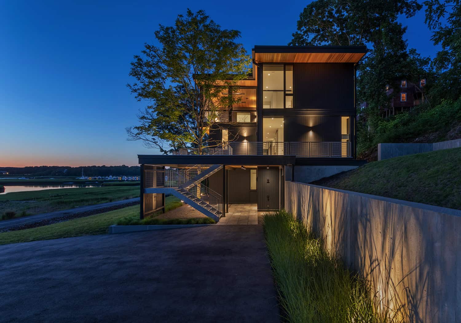 modern-river-house-exterior-dusk