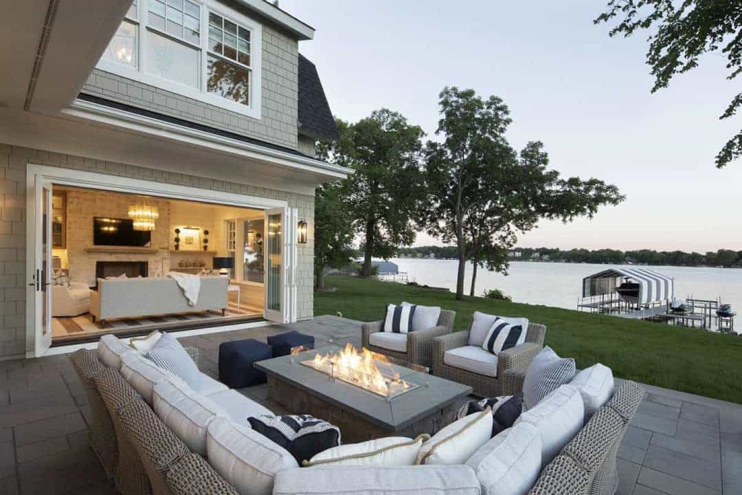 coastal-style-lake-house-retreat-patio-with-a-firepit