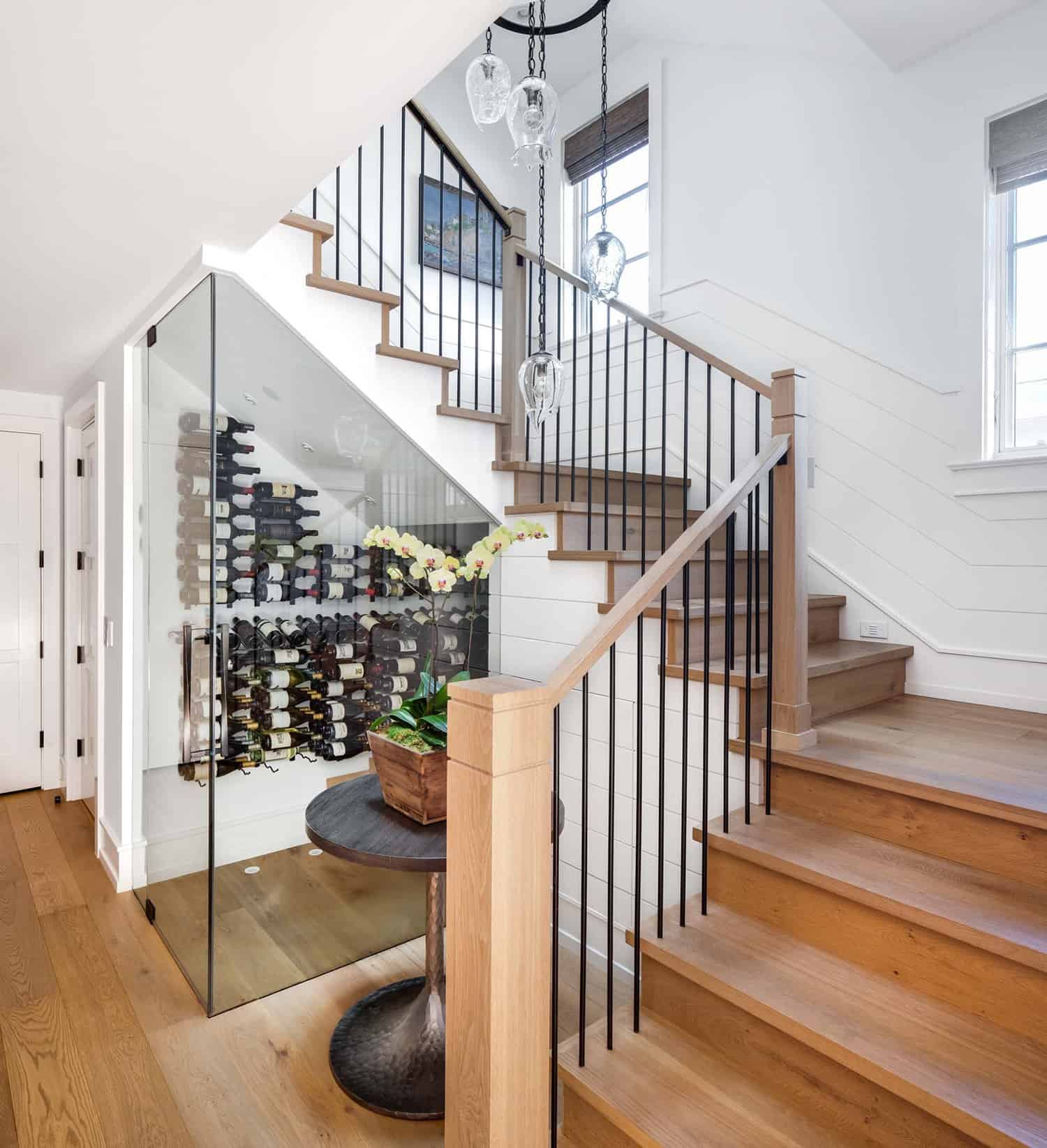 beach-style-staircase-with-wine-cellar