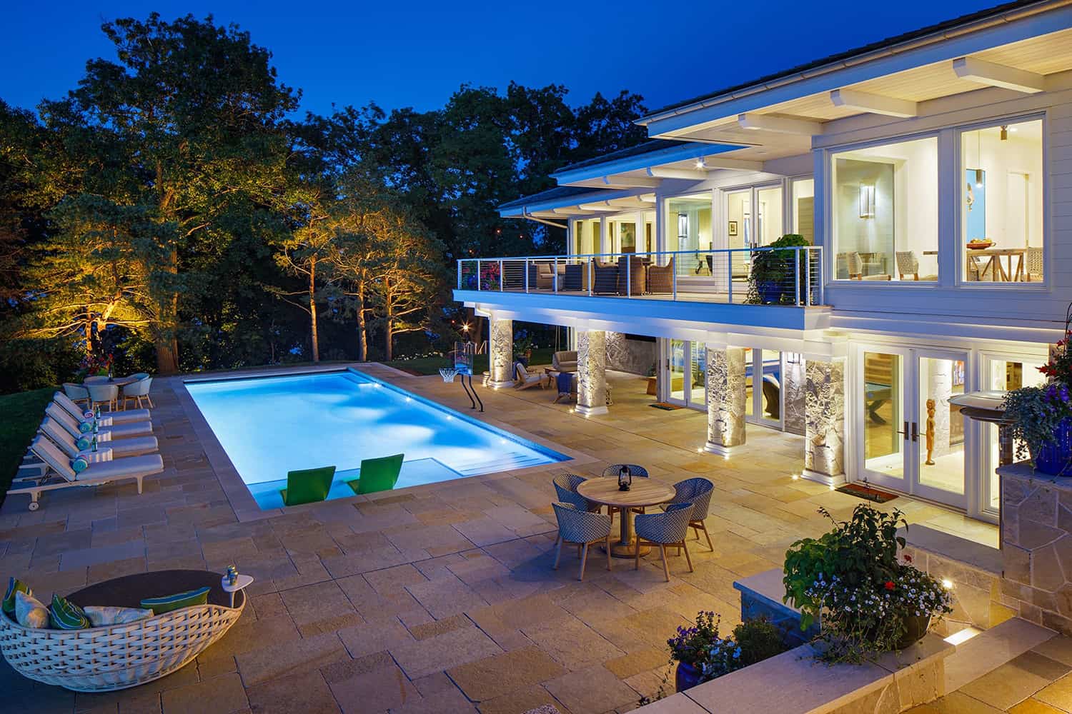 contemporary-lake-house-exterior-with-pool-at-dusk
