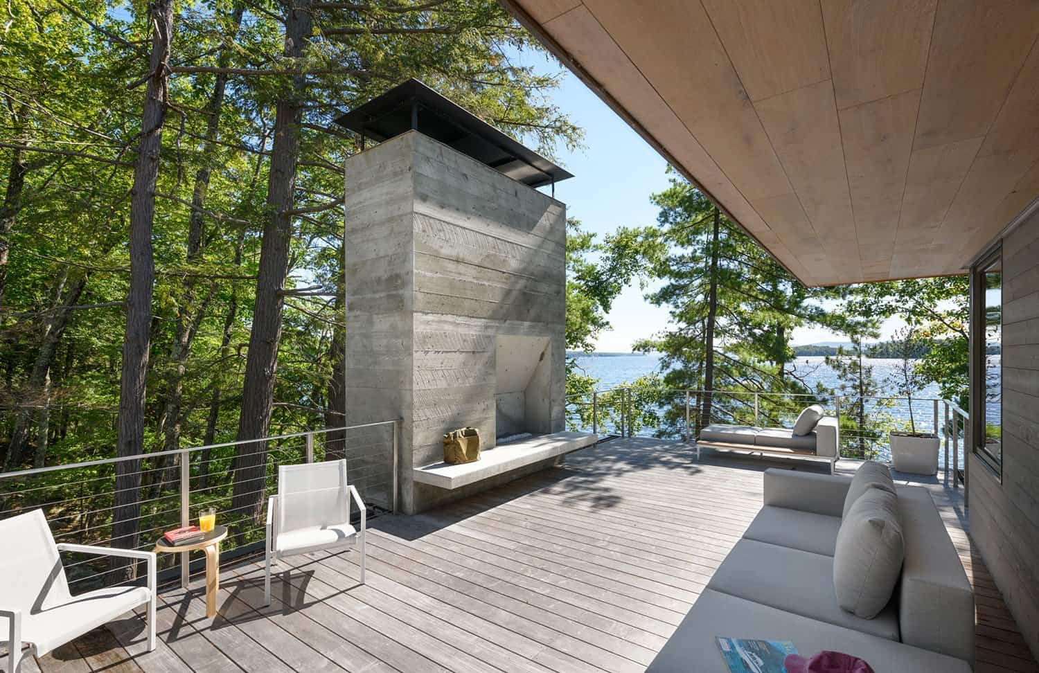 modern-lakeside-retreat-patio-with-a-fireplace