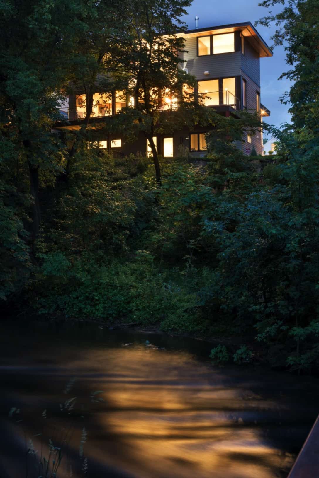 rustic-modern-creek-home-exterior-dusk