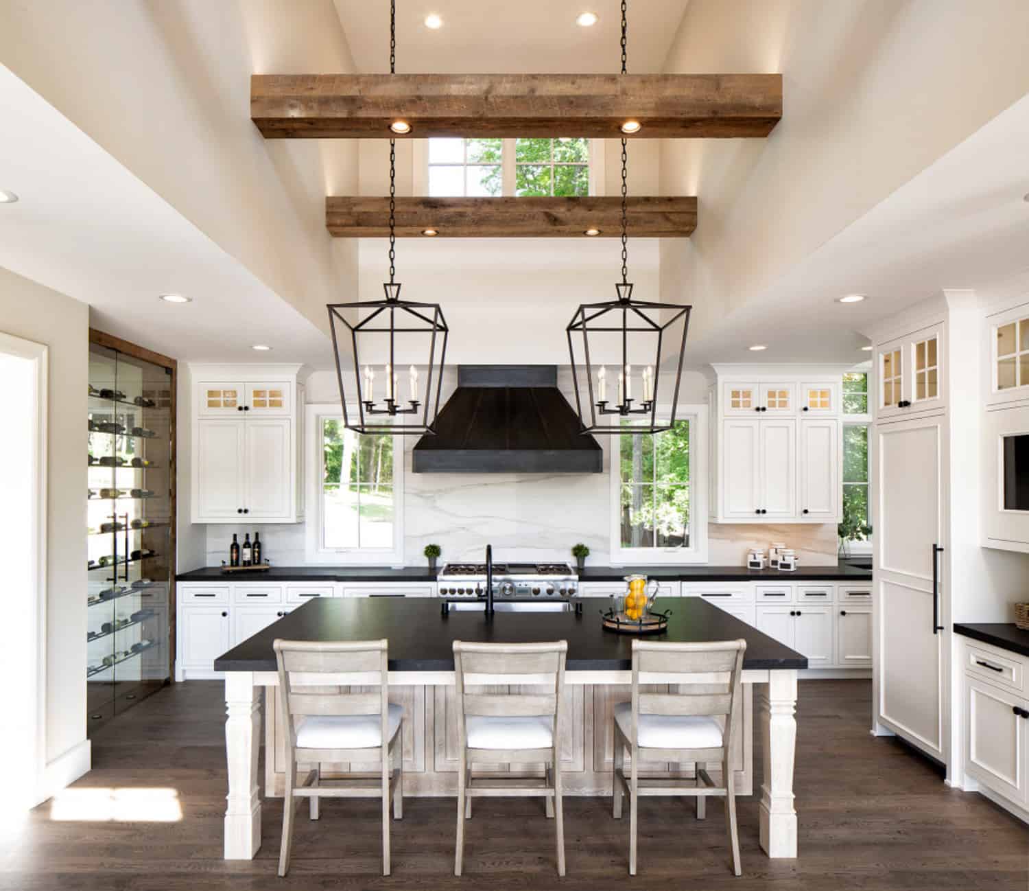 farmhouse-kitchen-with-wood-ceiling-beams-and-large-pendant-light-fixtures