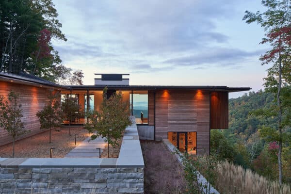 featured posts image for This North Carolina home cantilevers over a steep and rugged terrain