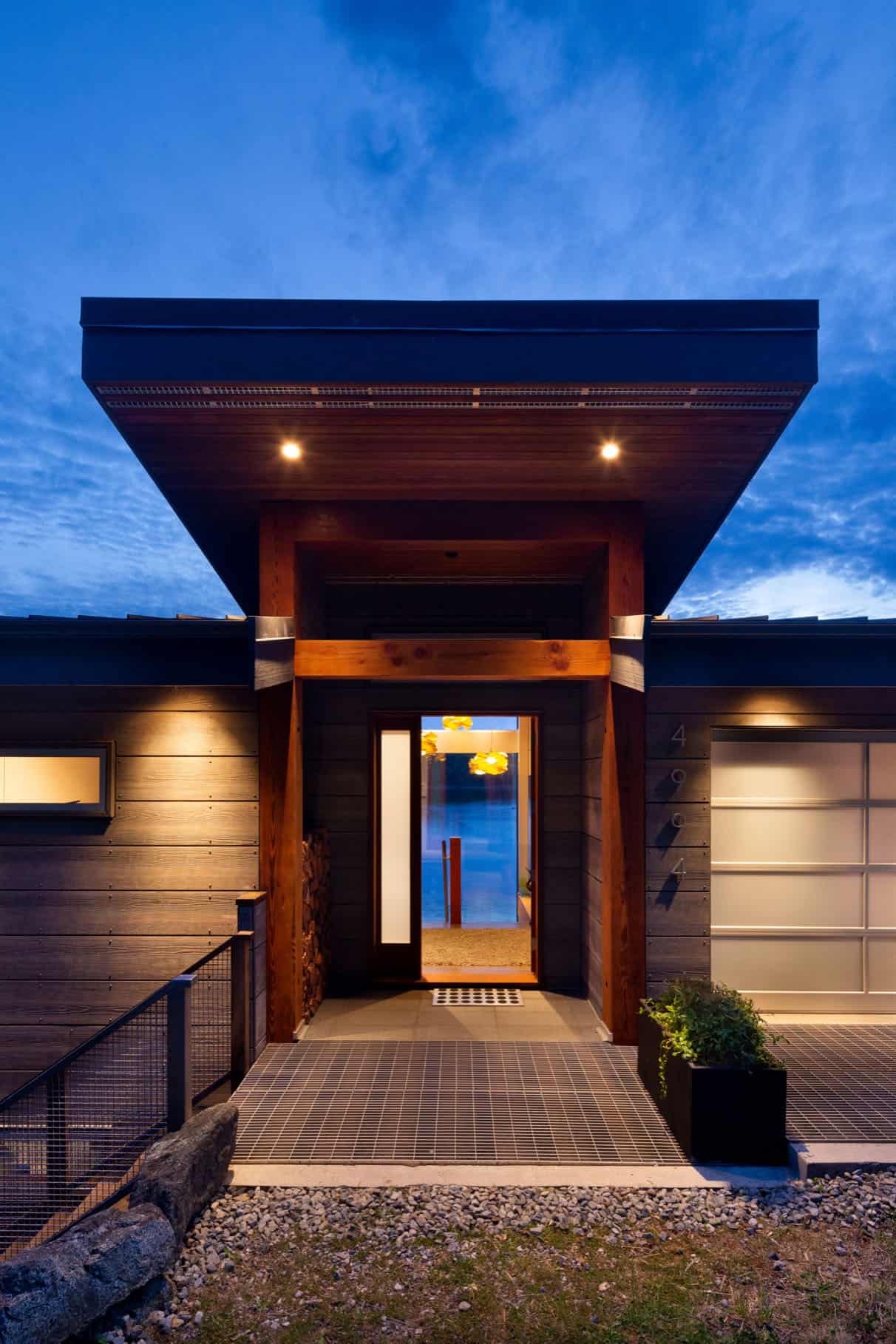 modern-waterfront-home-entry-at-dusk