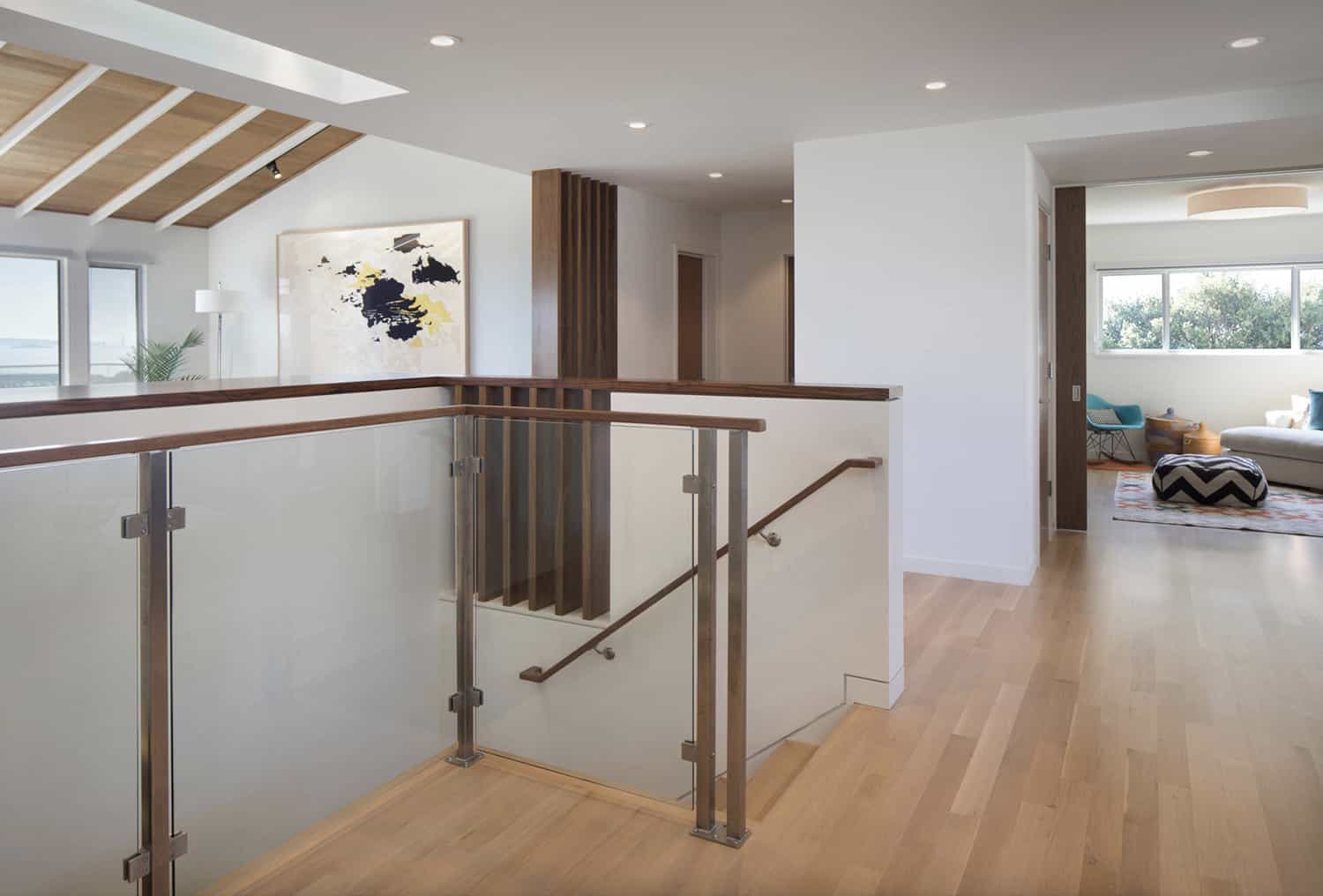 modern-stairs-with-family-room-pocket-doors
