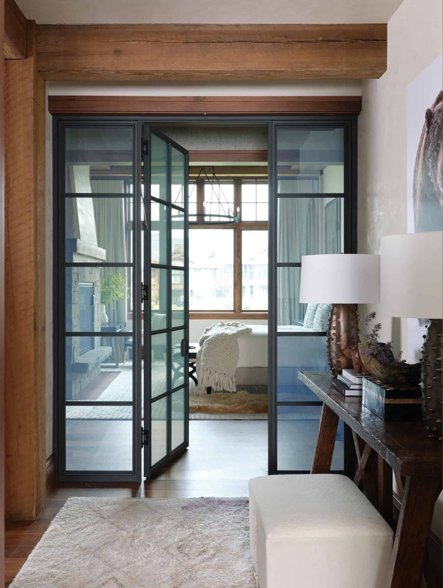 rustic-modern-bedroom-hallway-with-glass-and-steel-doors
