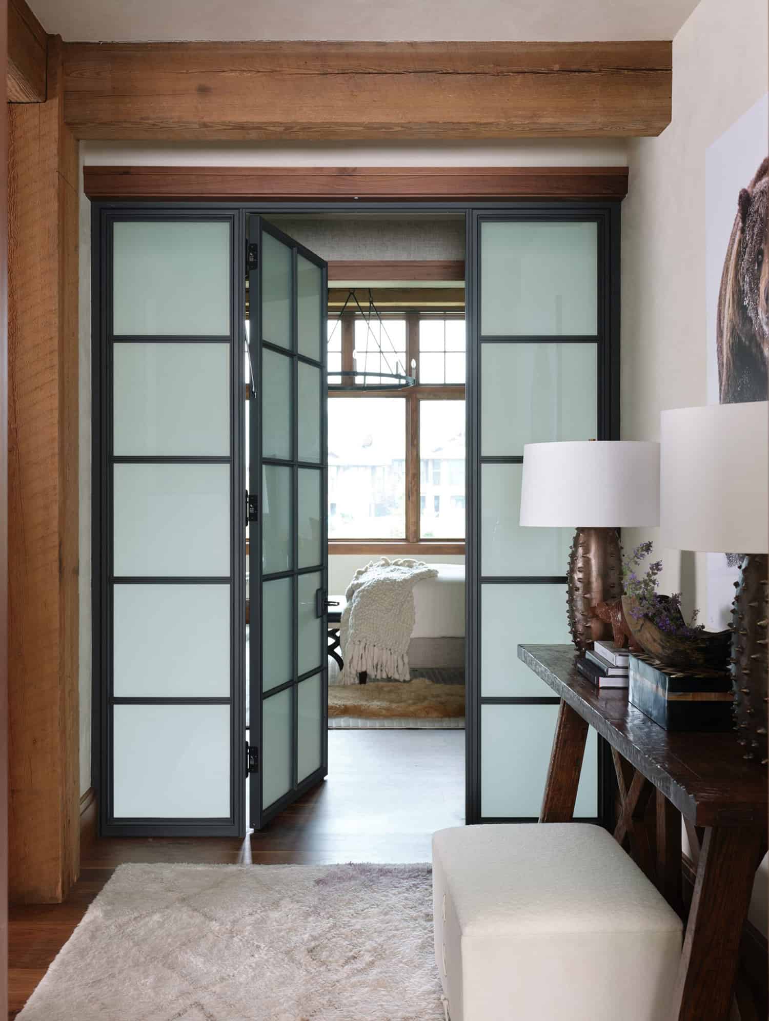 rustic-modern-bedroom-hallway-with-translucent-glass-and-steel-doors