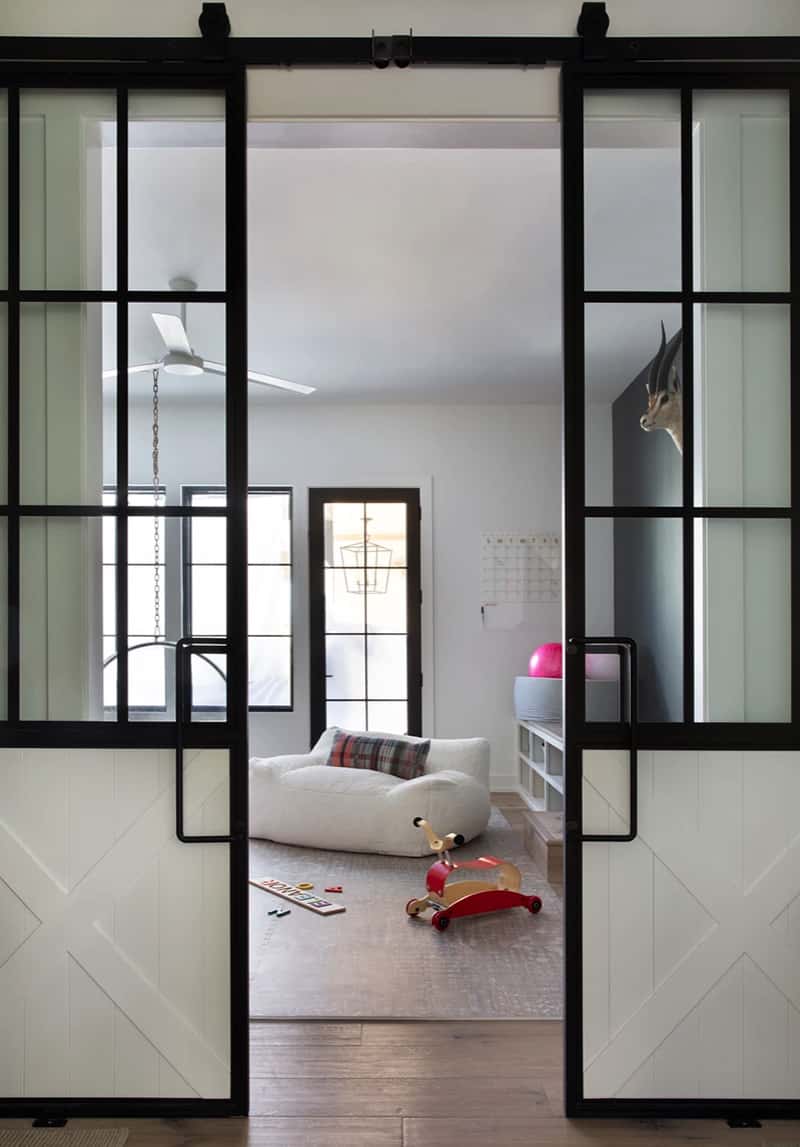 contemporary-kids-playroom-with-steel-and-glass-entry-doors