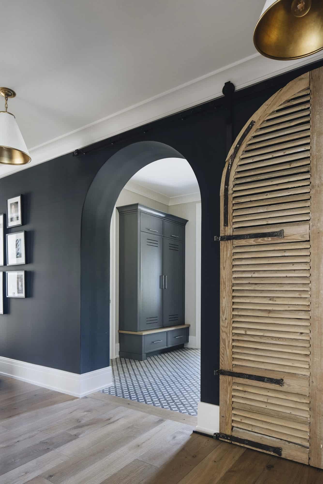  transitional-style-hallway-with-black-walls