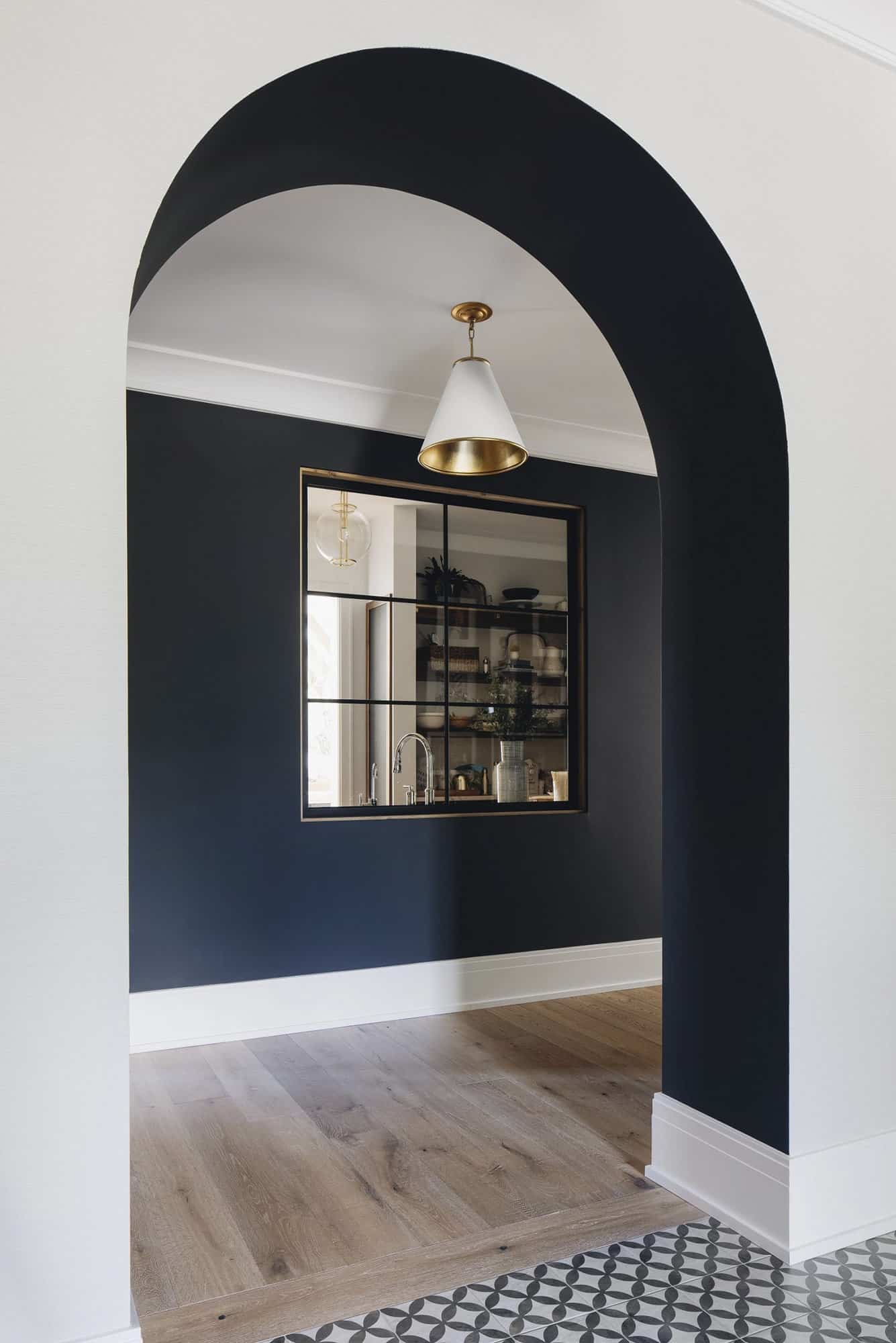   transitional-style-hallway-with-black-walls