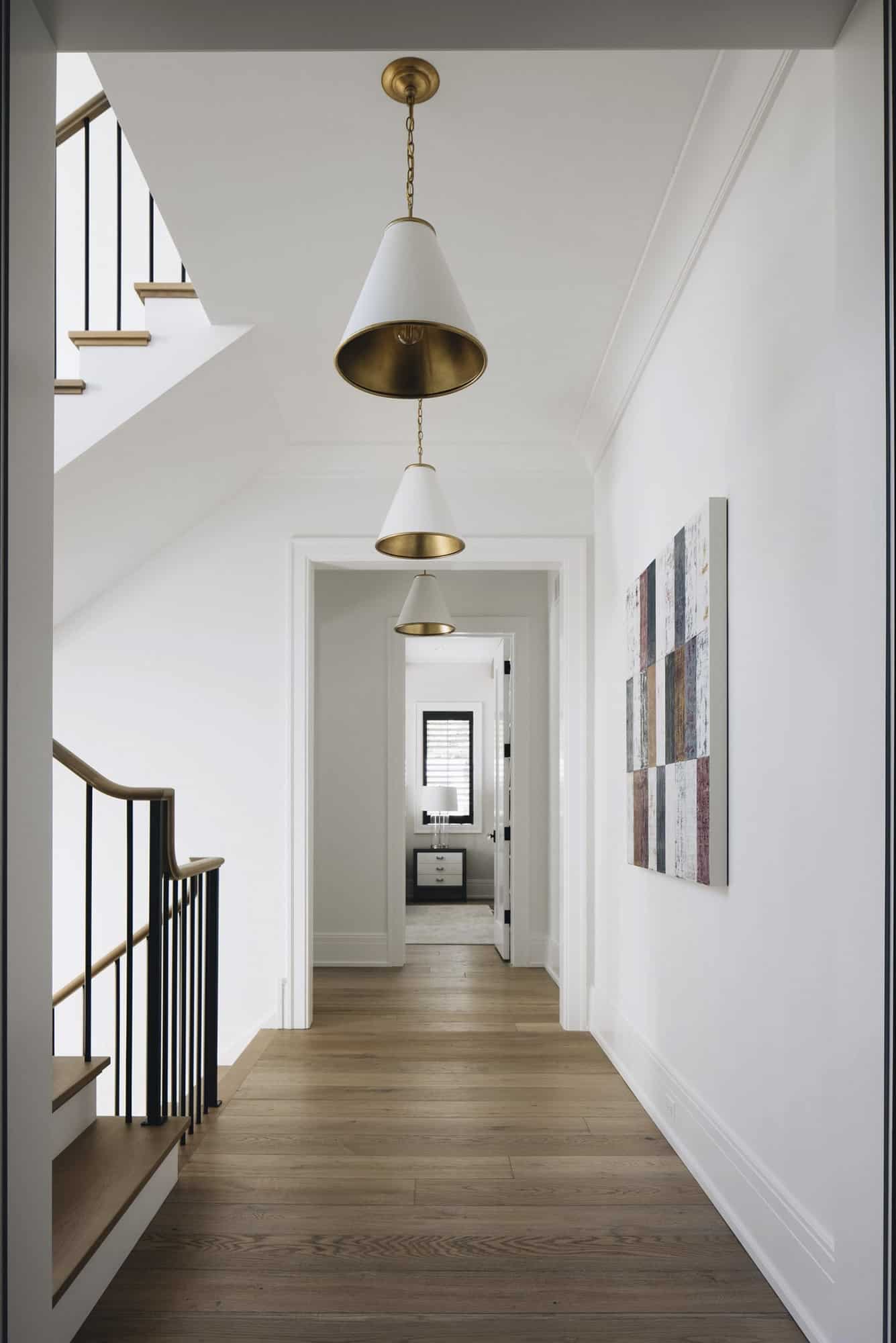  transitional-style-hallway-with-a-staircase