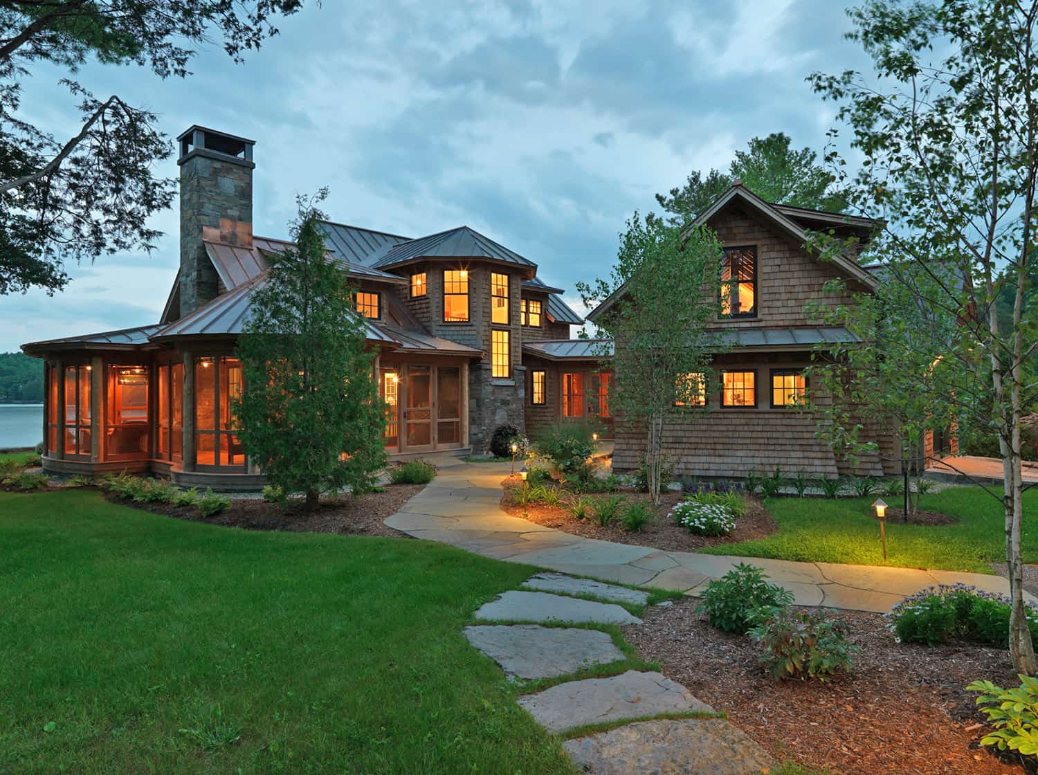 A camp style home nestled on the breathtaking Lake Champlain