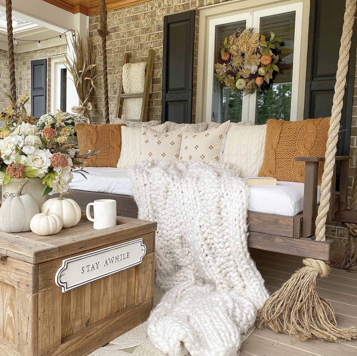 front-porch-swing-with-fall-decor