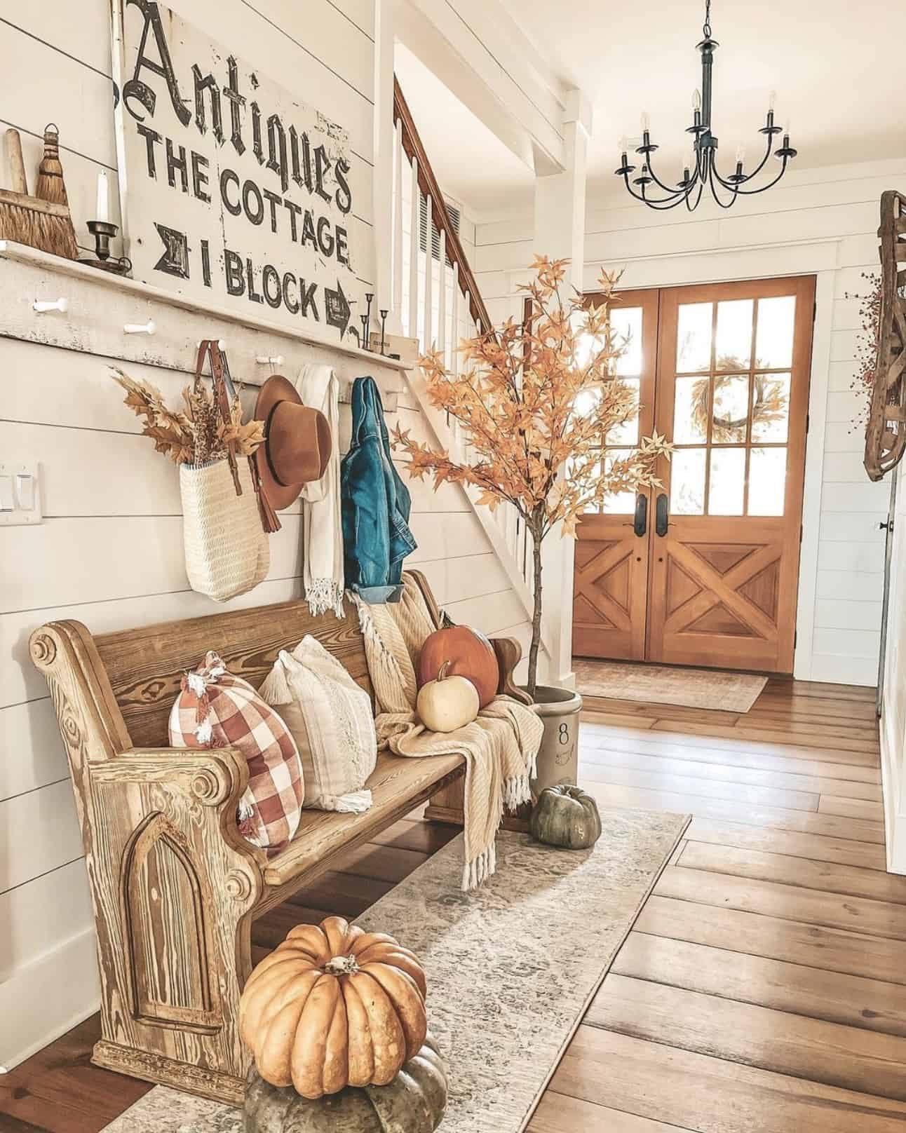 farmhouse-entryway-with-antique-wood-bench-and-fall-home-decor