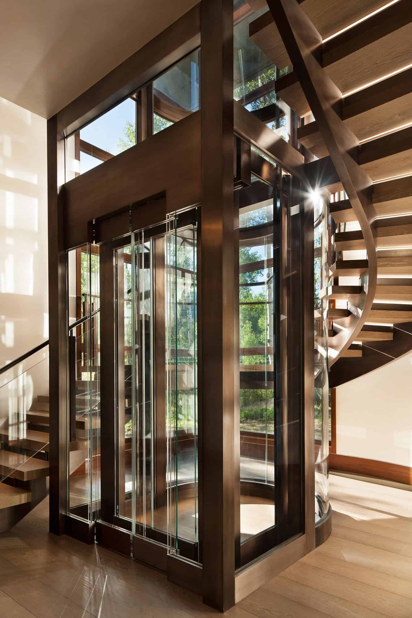 contemporary-staircase-with-glass-elevator
