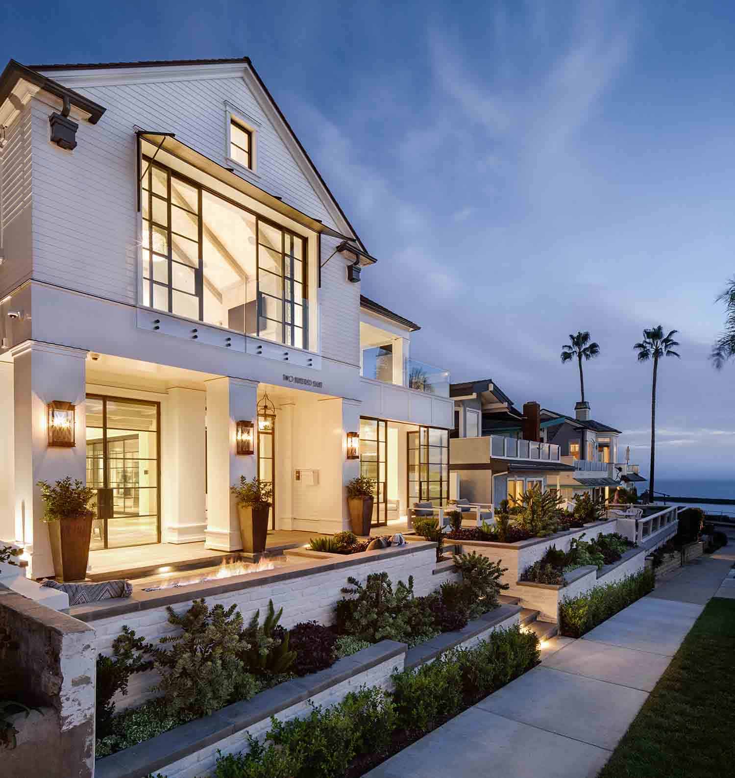 transitional-style-home-exterior-at-dusk