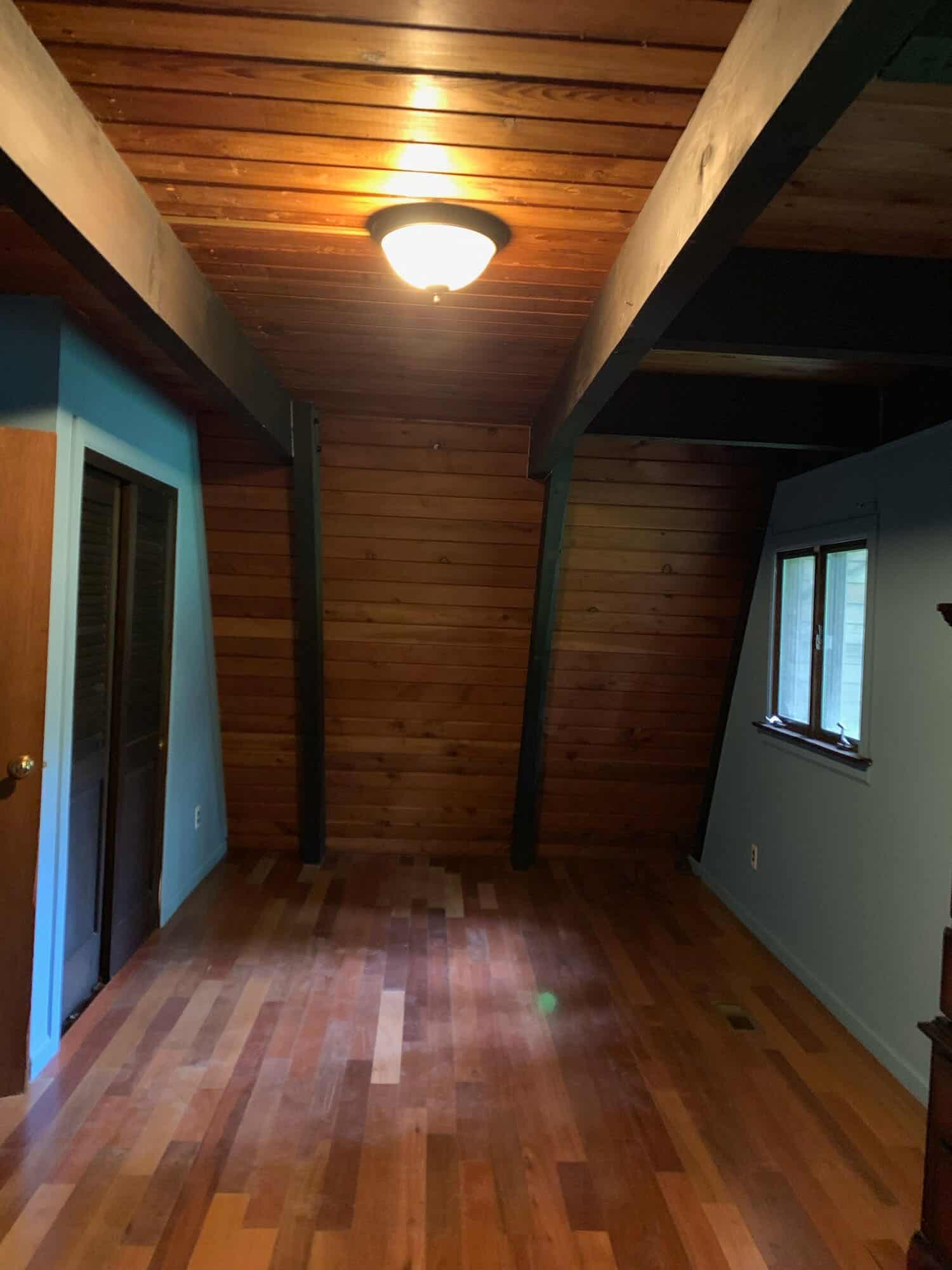 a-frame-cabin-bedroom-before-the-renovation