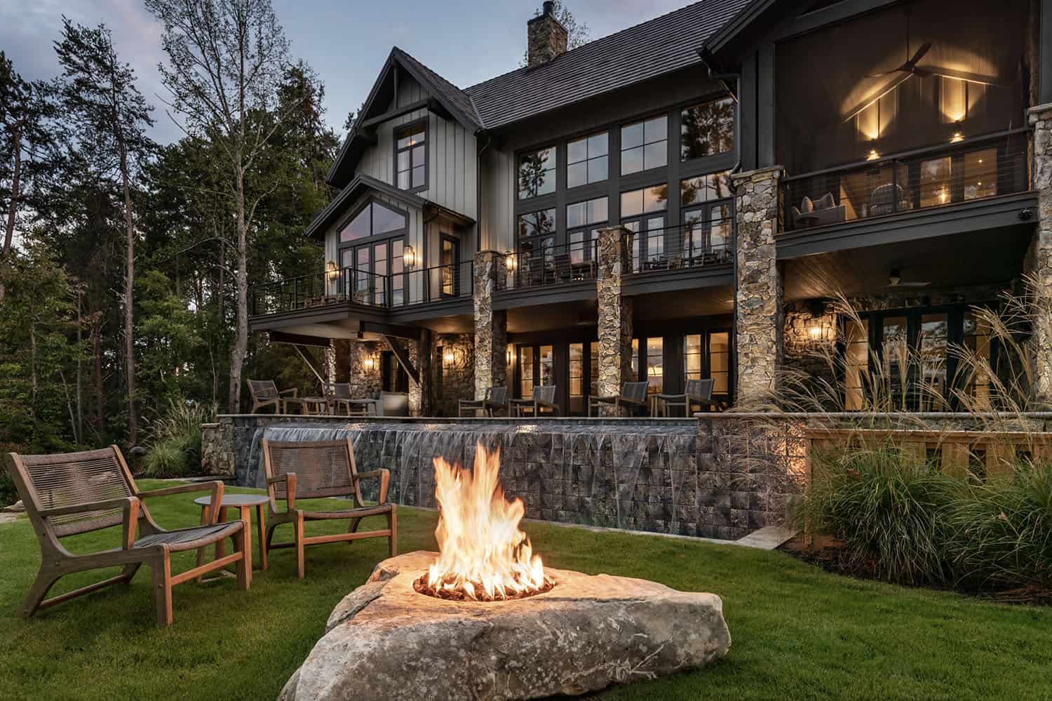 contemporary-mountain-lake-home-backayrd-with-a-fire-pit