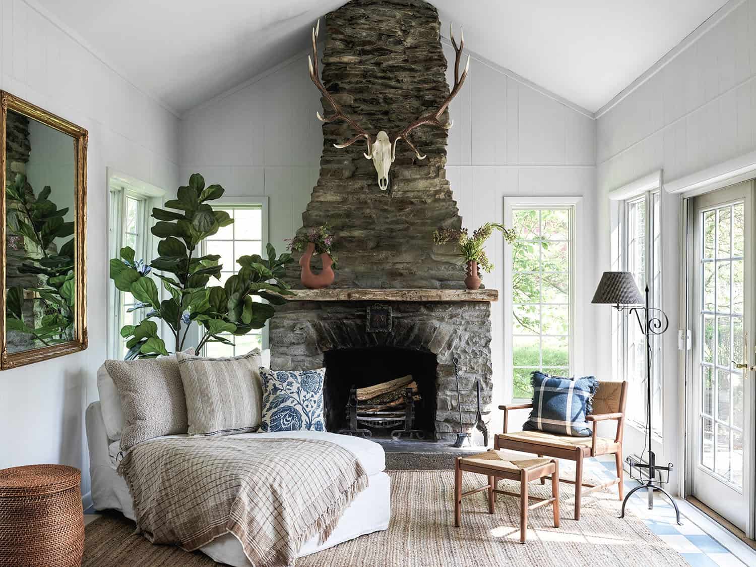 country-farmhouse-sunroom-with-a-fireplace