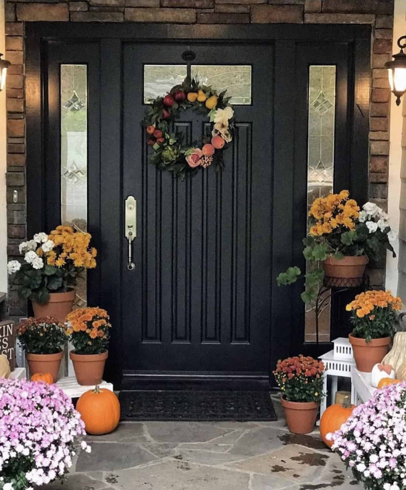fall-front-porch-with-a-black-painted-door