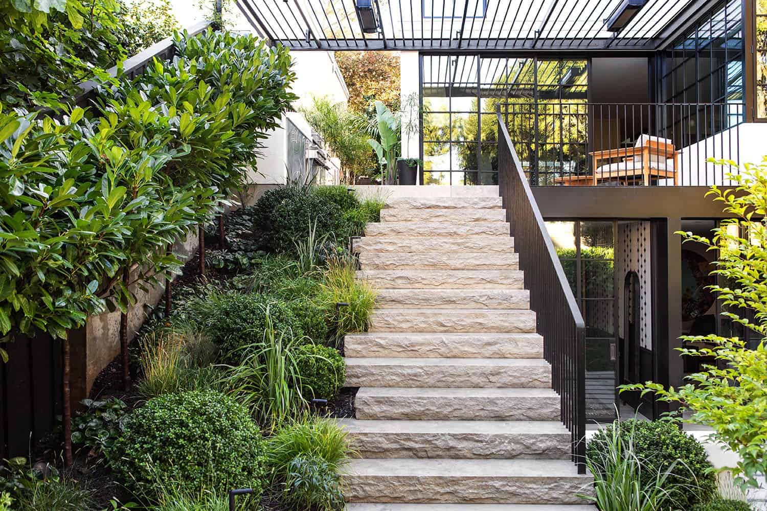 transitional-patio-with-a-stone-staircase